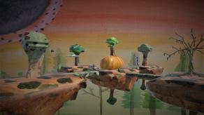 Capture d'écran du projet Bouh! Des arbres et une citrouille sont sur des morceaux de terre flottants.
