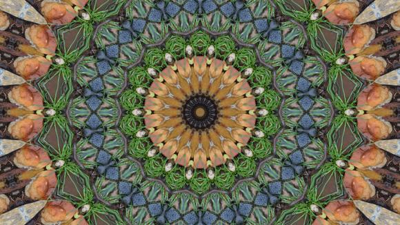 Image kaléidoscopique presque architecturale. Elle présente des teintes d'ocre et de bleu.